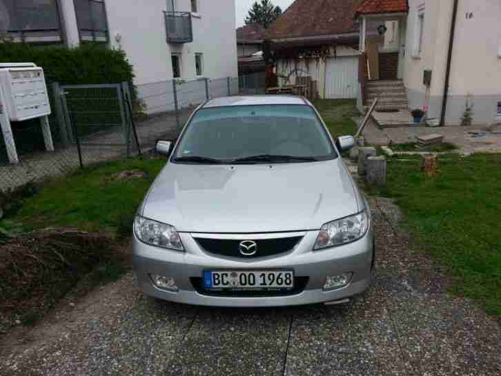 Mazda 323 Silber
